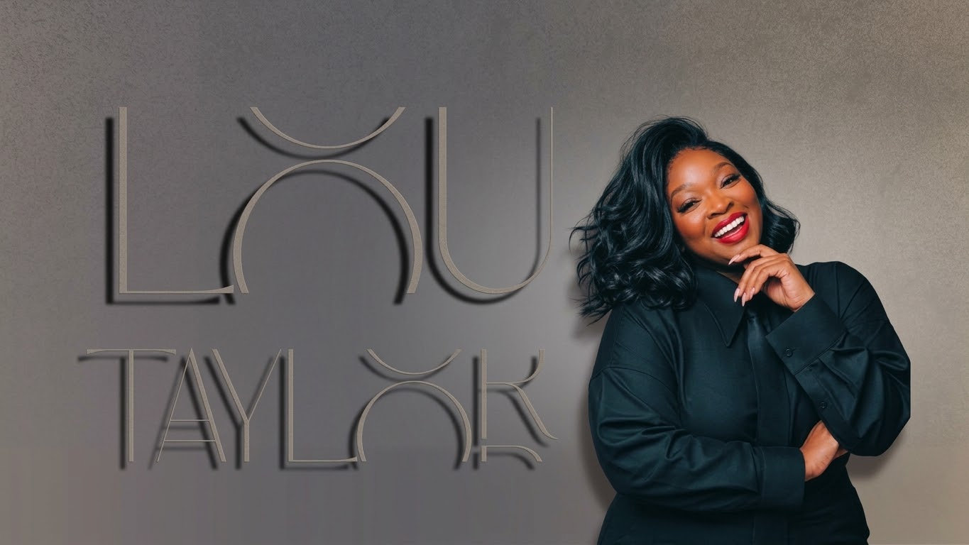 Lou Taylor smiling, hand at her chin, beside the LOU TAYLOR wordmark